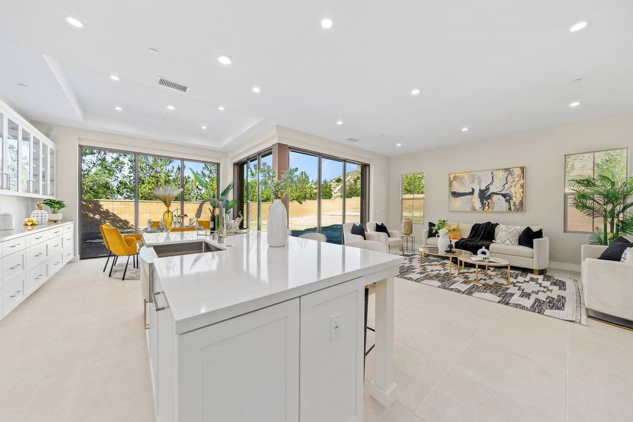 Luxury open kitchen and living room remodel with island