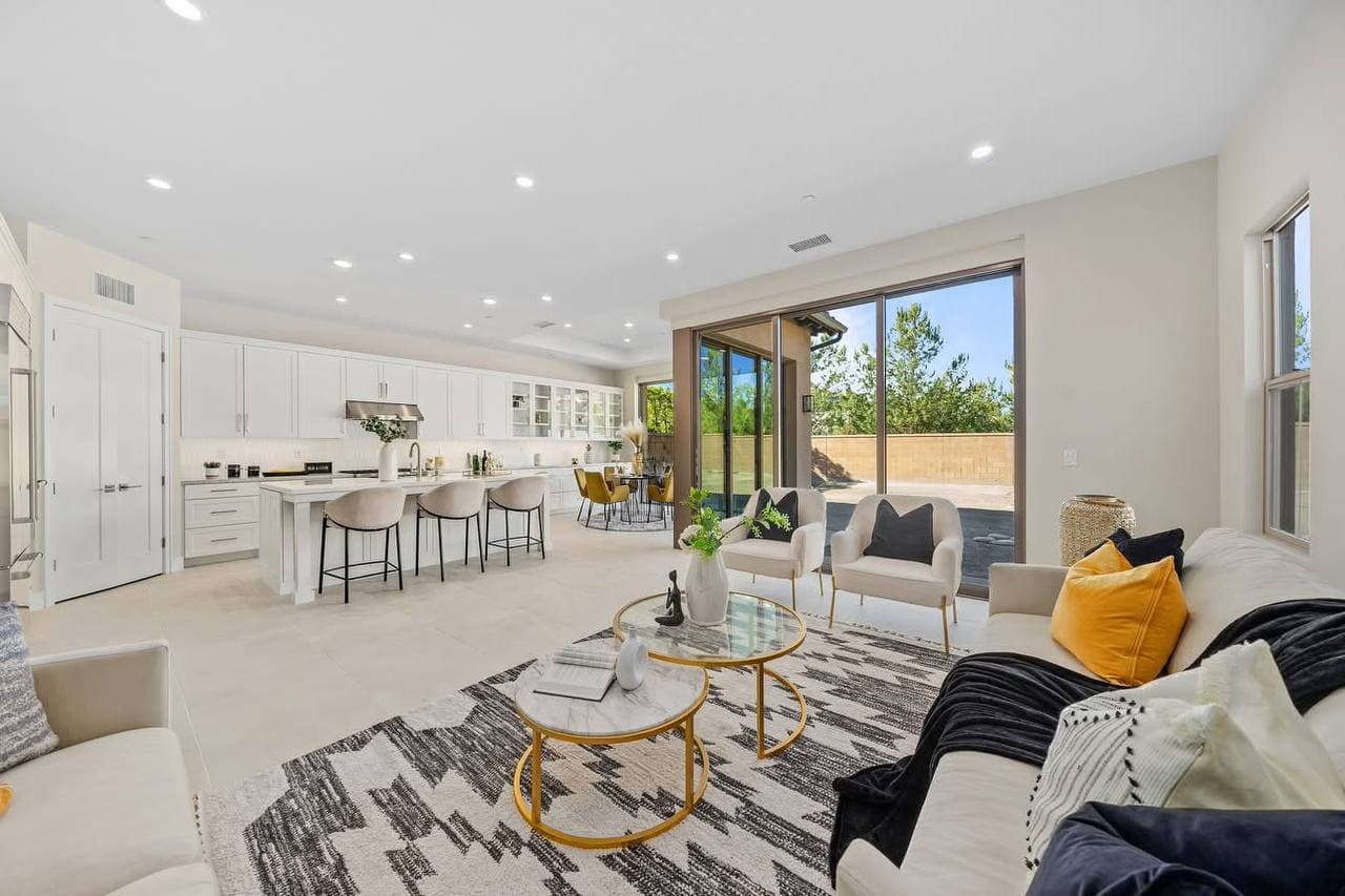 High-end kitchen renovation with custom cabinetry and living area