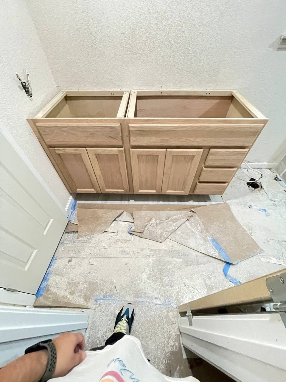 Kitchen cabinet installation mid-renovation