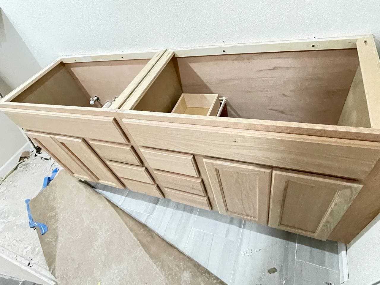 Open kitchen and living renovation with new flooring